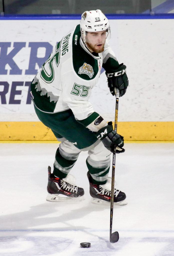 The Silvertips’ Aaron Irving looks to pass during a game against Spokane this past Sunday afternoon at Xfinity Arena. (Kevin Clark / The Herald)
