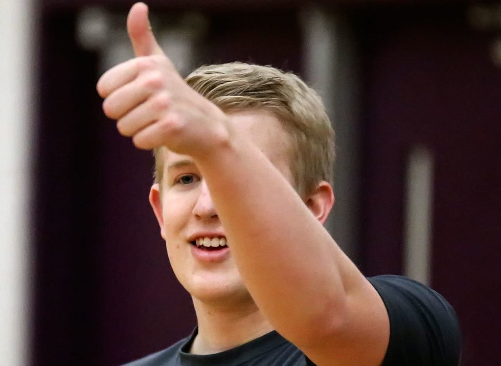 Dylin Stoen, senior, assistant coach addresses the score keepers Friday afternoon at Lake Stevens High School on January 13, 2017. (Kevin Clark / The Herald)
