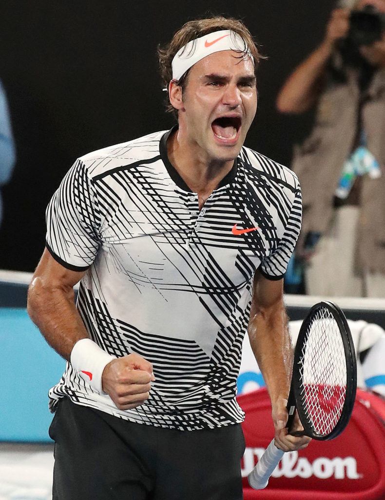 Switzerland’s Roger Federer celebrates after defeating Spain’s Rafael Nadal in the men’s singles final at the Australian Open tennis championships in Melbourne, Australia, Sunday, Jan. 29, 2017. (AP Photo/Aaron Favila)
