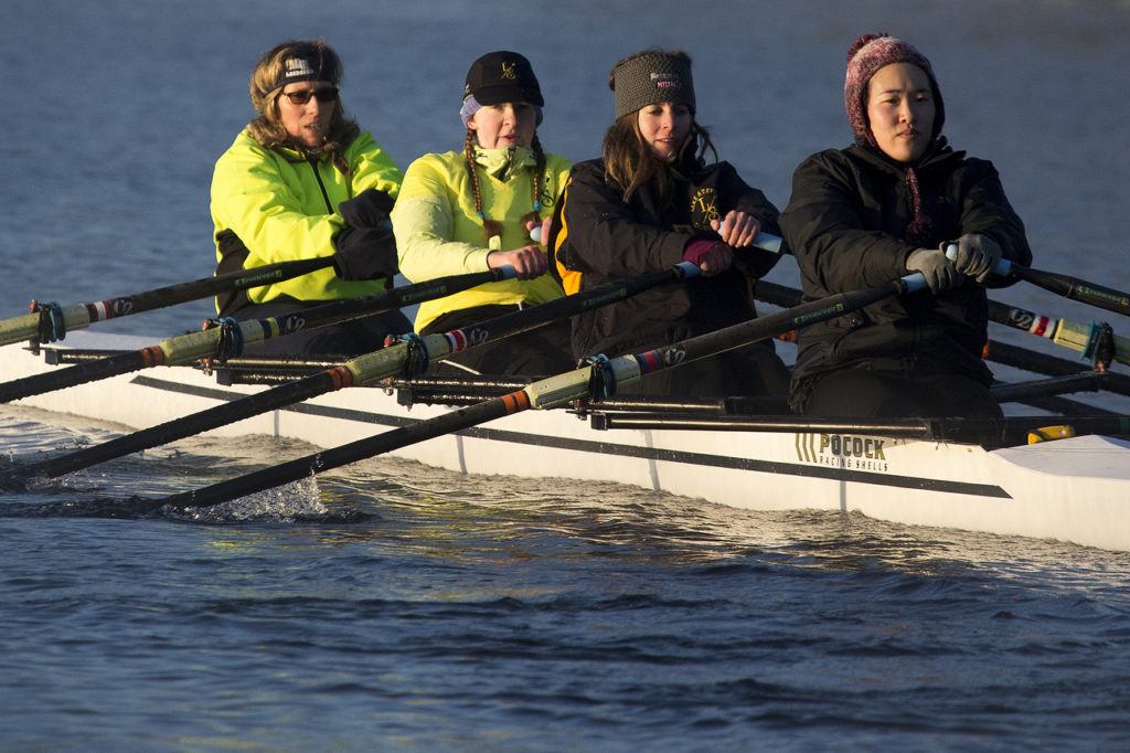 Club members head out onto the frigid waters of Lake Stevens in the early morning. (Ian Terry / The Herald)
