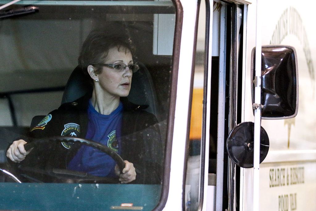 Debra Draper backs the food truck into its parking space in the hangar at Taylor’s Landing. (Kevin Clark / The Herald)
