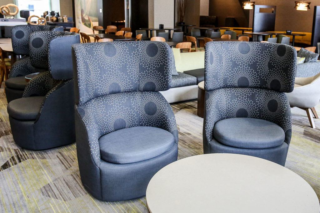 The lobby of the Everett Courtyard by Marriott, eight-story 156-room hotel, opened in October. (Kevin Clark / The Herald)
