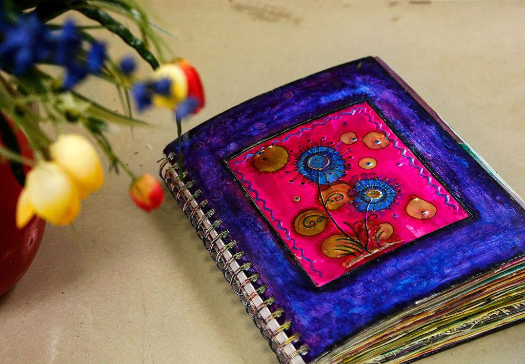 Dawn created a book filled with unique examples. (Dan Bates / The Herald)
