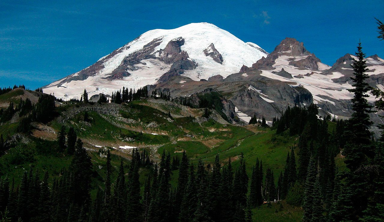 Mount Rainier dominates the skyline from the eastern edge of the Wonderland Trail seen in 2008. In the future, it may be packed with people keeping their heads buried in their smart phones. (Jessi Loerch / Herald file)