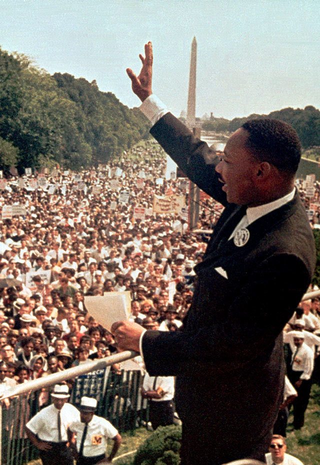 Dr. Martin Luther King Jr. acknowledges the crowd at the Lincoln Memorial for his “I Have a Dream” speech during the March on Washington, D.C., Aug. 28, 1963. (Associated Press / File)