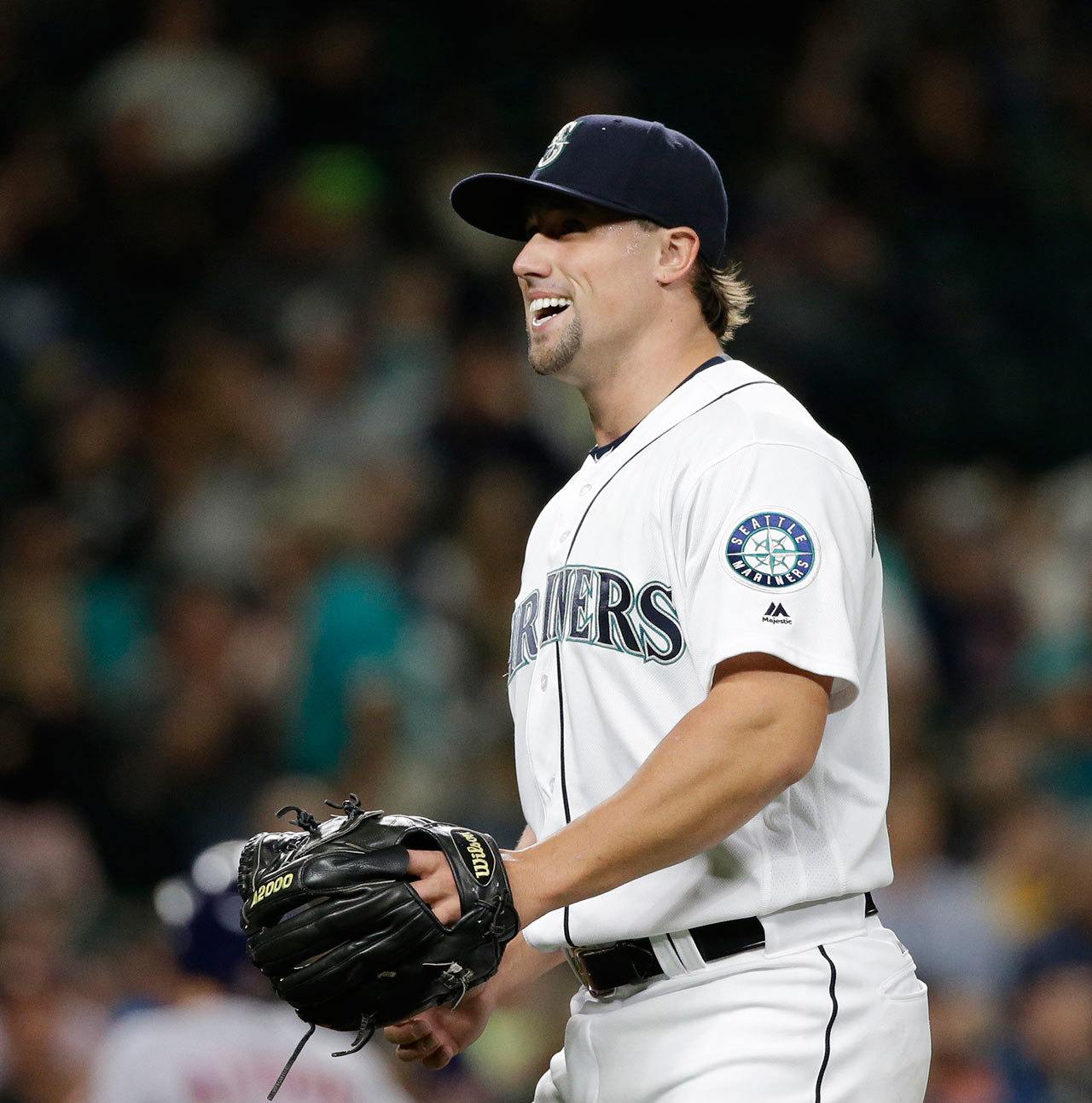 Seattle Mariners relief pitcher Dan Altavilla smiles after throwing in a Sept. 16, 2016, game in Seattle. (AP Photo/Elaine Thompson)