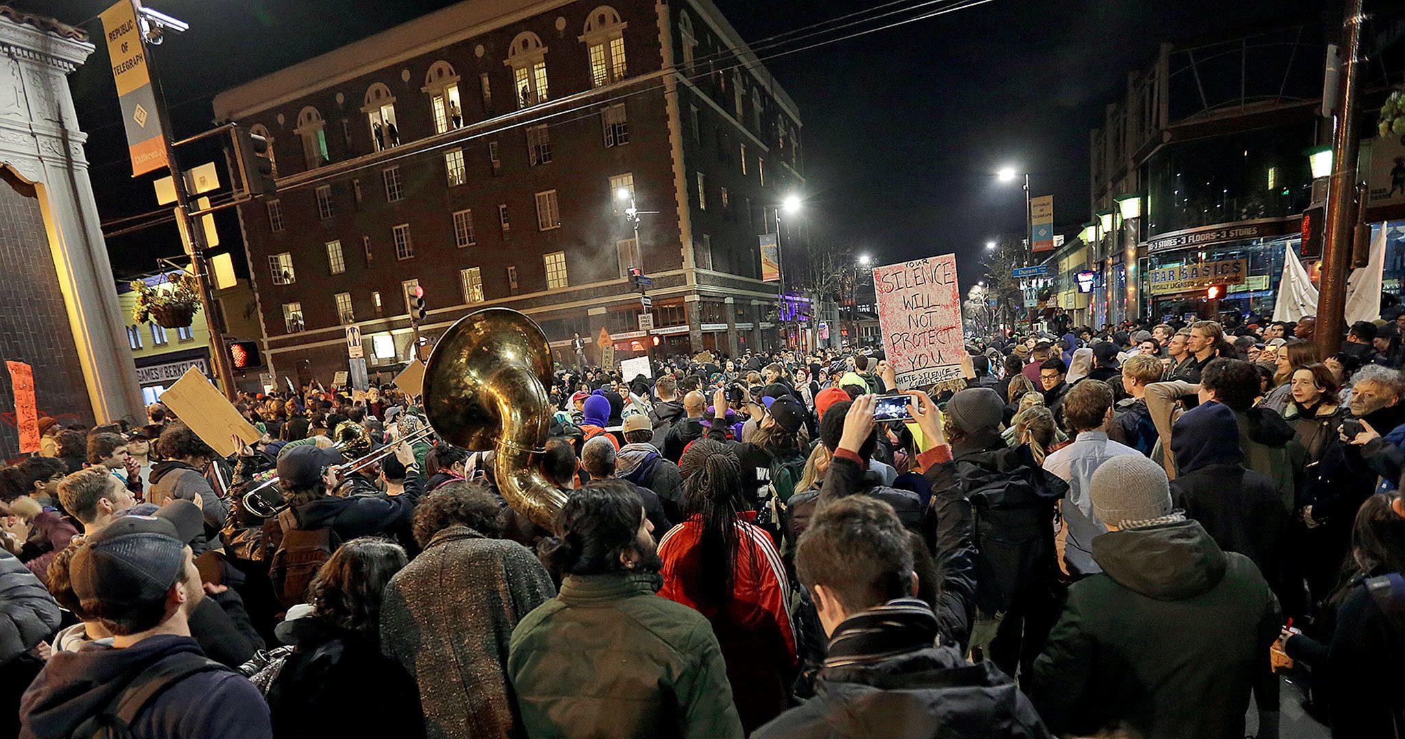 Protesters opposed to a speech by Breitbart News editor Milo Yiannopoulos on the University of California campus march on Telegraph Avenue Wednesday night in Berkeley, Calif. (AP Photo/Ben Margot)