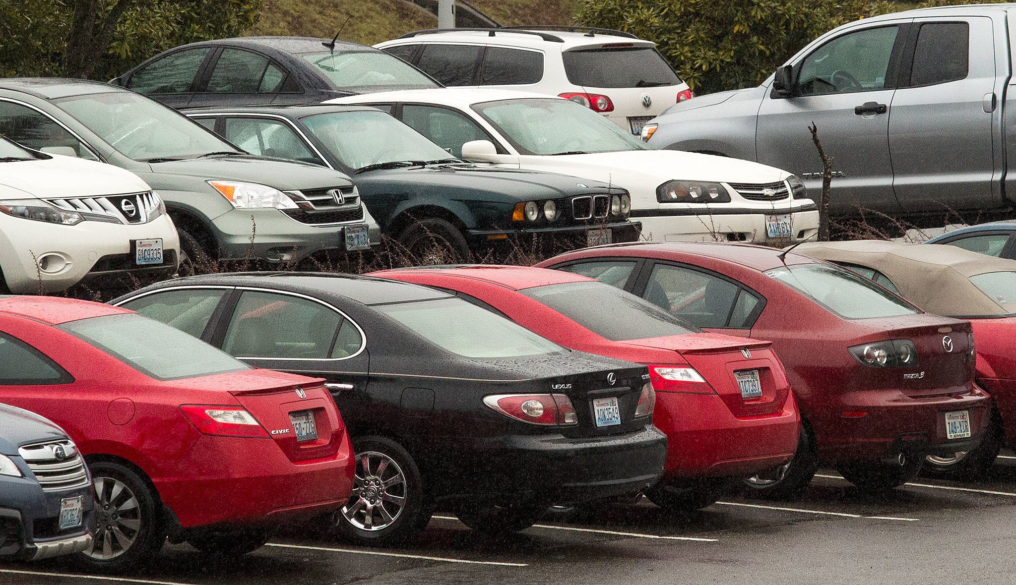 Engine oil and coolant (anti-freeze) are the top offenders when it comes to leaks from vehicles. But the actual list of potential sources of leaks is much longer. (Andy Bronson / The Herald)