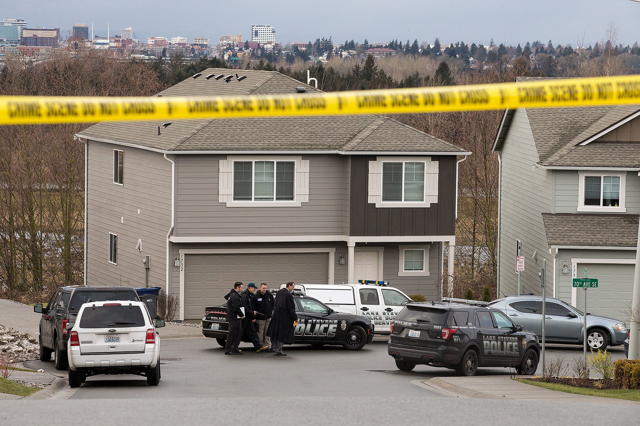 SMART detectives investigate a shooting involving a Lake Stevens Police Officer near 18th Place SE on Thursday, Feb. 9, 2017 in Lake Stevens, Wa. (Andy Bronson / The Herald)