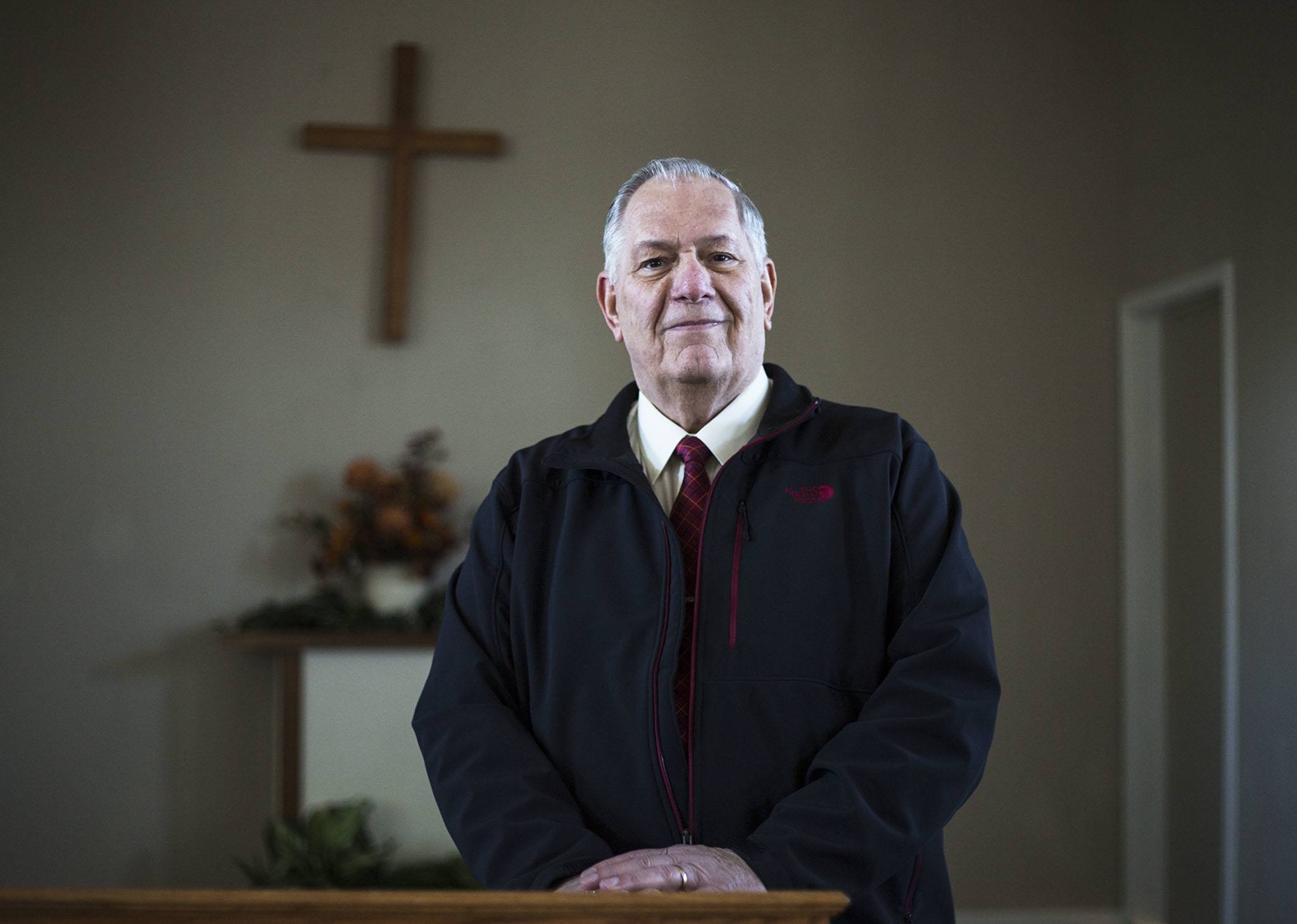 Pastor Jerry Back poses for a portrait at the North Creek Country Church on Tuesday in Bothell. Back helps struggling churches remain open, including the North Creek Country Church, where he volunteered as interim pastor for the past five years. (Daniella Beccaria / The Herald)