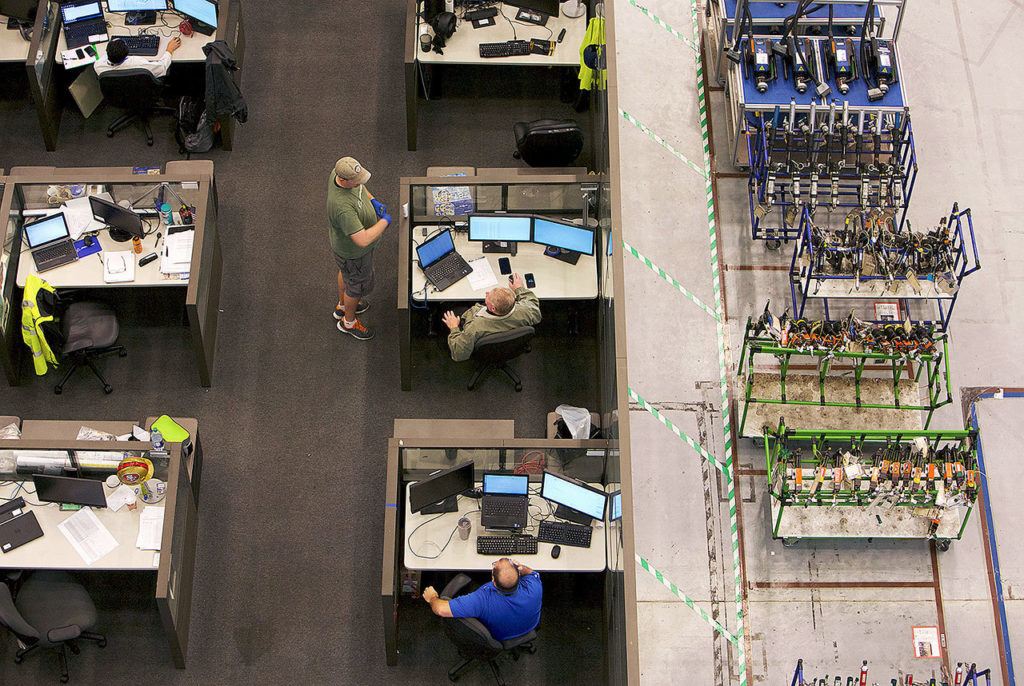 Employees work on computers at Boeing’s final assembly facility in North Charleston, South Carolina. (Travis Dove / Bloomberg) 

