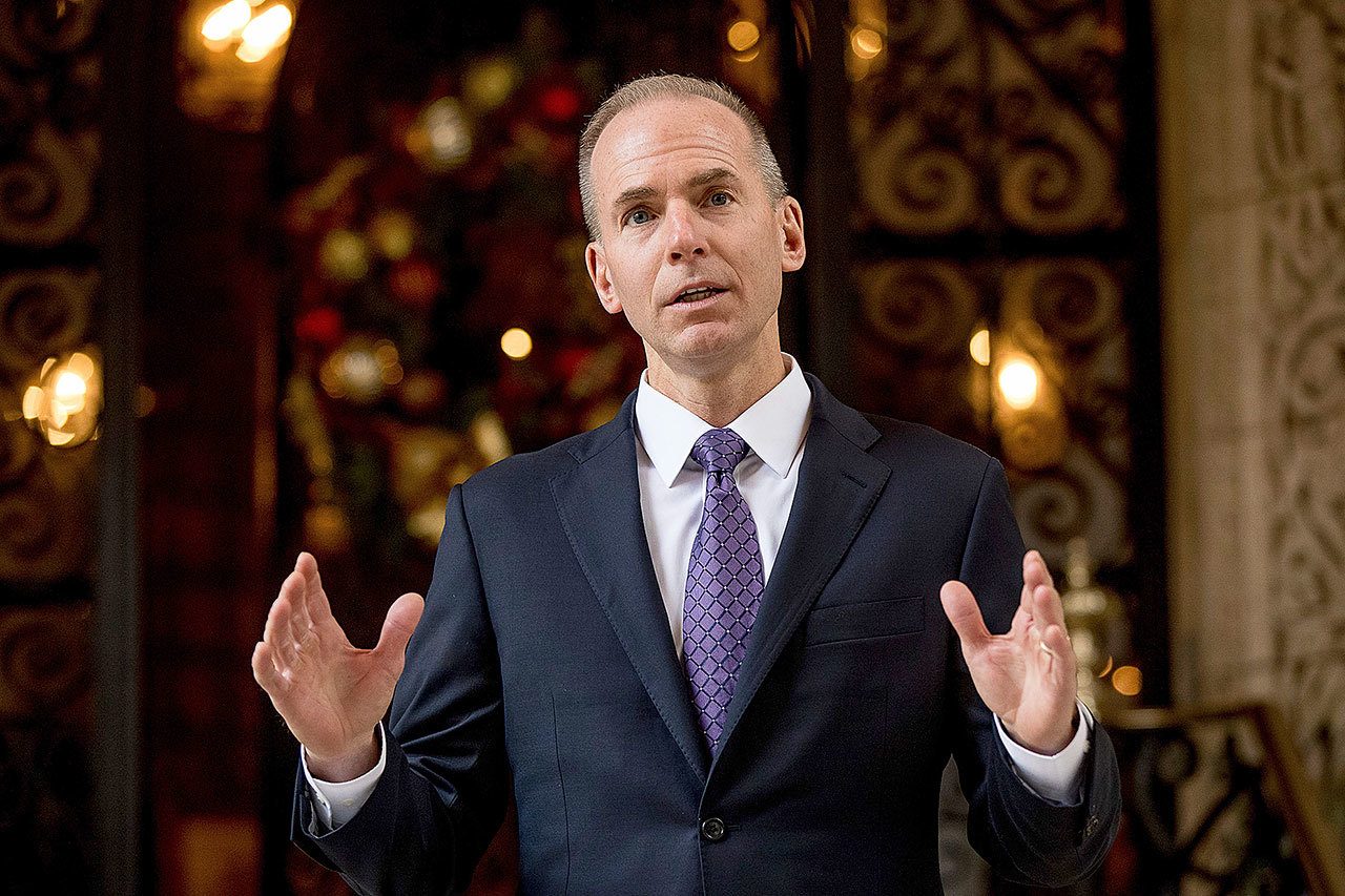 Boeing CEO Dennis Muilenburg speaks to the media after meeting with President-elect Donald Trump in Palm Beach, Florida, in December. (AP Photo/Andrew Harnik)