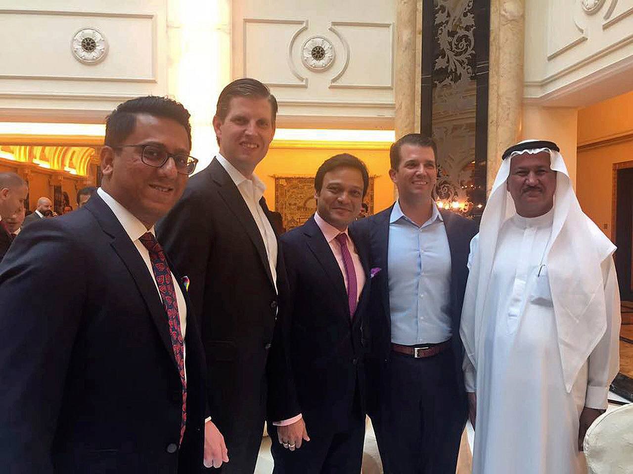 From left, Banke International director Niraj Masand, Eric Trump, Banke International director Porush Jhunjhunwala, Donald Trump Jr. and DAMAC Properties chairman Hussain Sajwani pose for a photo during festivities marking the formal opening of the Trump International Golf Club, in Dubai, United Arab Emirates, on Saturday. (AP Photo)