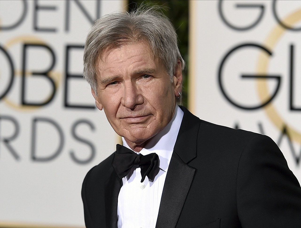 In this Jan. 10 photo, Harrison Ford arrives at the 73rd annual Golden Globe Awards in Beverly Hills, California. NBC reports that Ford, an experienced pilot, was told to land on a runway at John Wayne Airport in Orange County on Monday, Feb. 13, but mistakenly landed on a parallel taxiway, passing over an American Airlines jet holding nearby. (Photo by Jordan Strauss/Invision/AP, File)