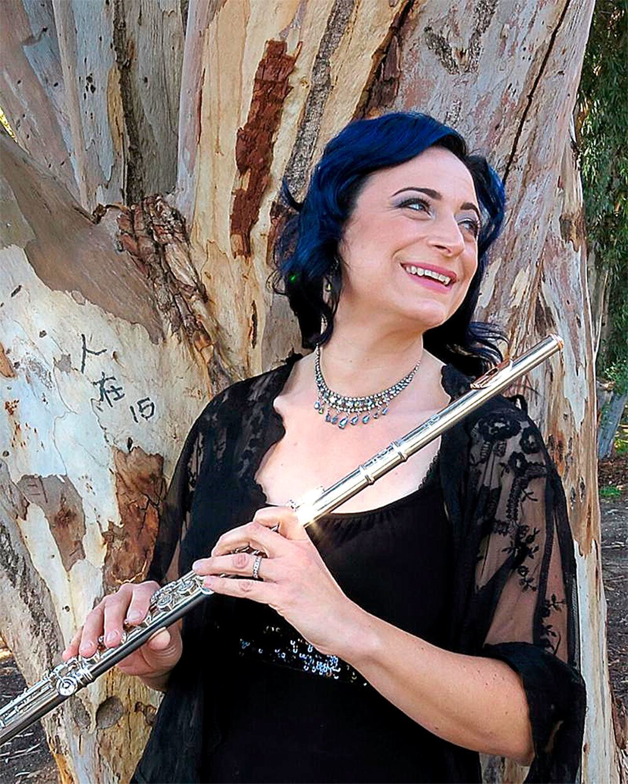 Flutist Janelle Janovich-Barrera will perform with the Everett Philharmonic Orchestra on Sunday afternoon.