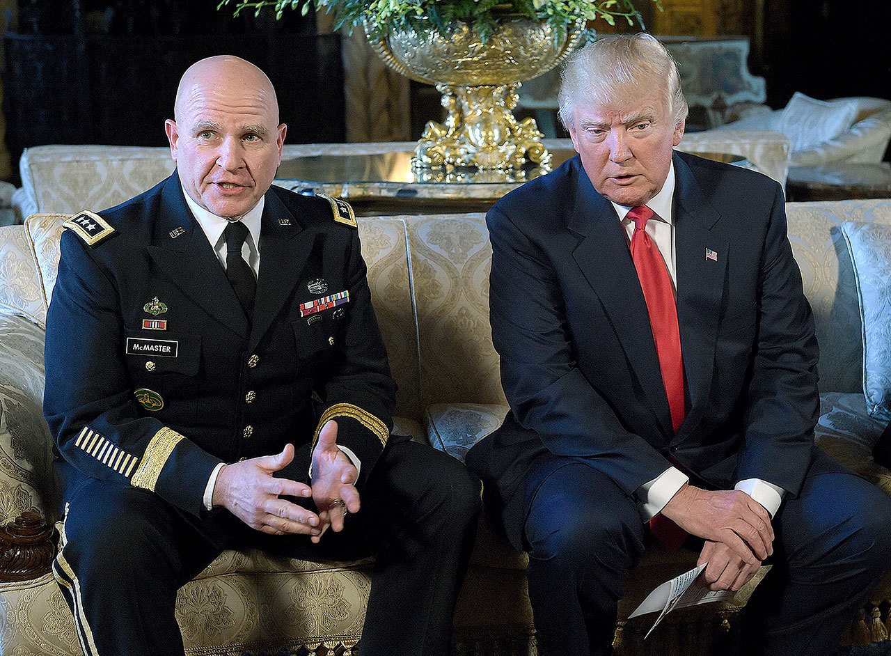 President Donald Trump (right) listens as Army Lt. Gen. H.R. McMaster, his new national security advisor, talks at Trump’s Mar-a-Lago estate in Palm Beach, Florida, on Monday. (AP Photo/Susan Walsh)