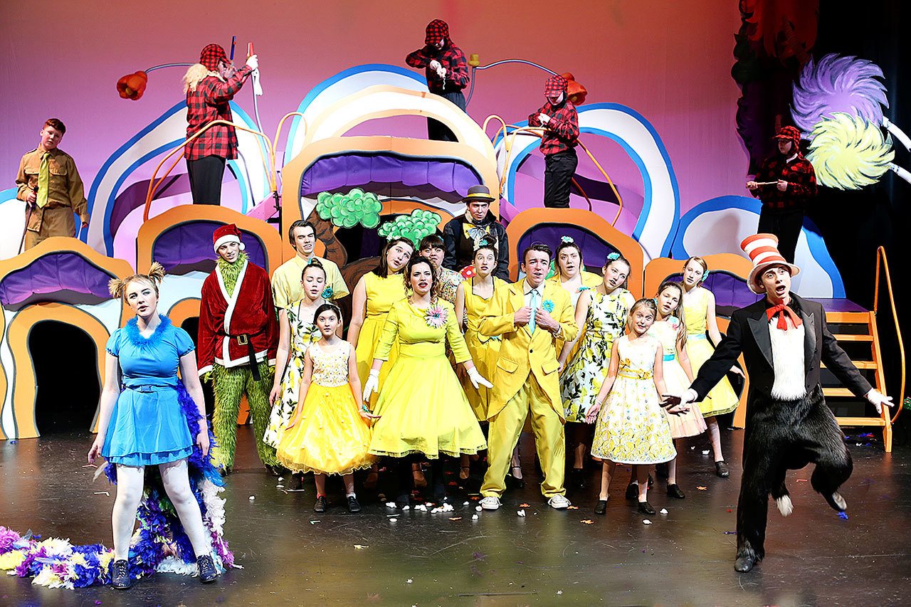 Erik Ortiz, far right, leads the cast of the musical “Seussical.” The production, staged by Ludus Performing Arts, opens Feb. 3 at the PUD auditorium in Everett.