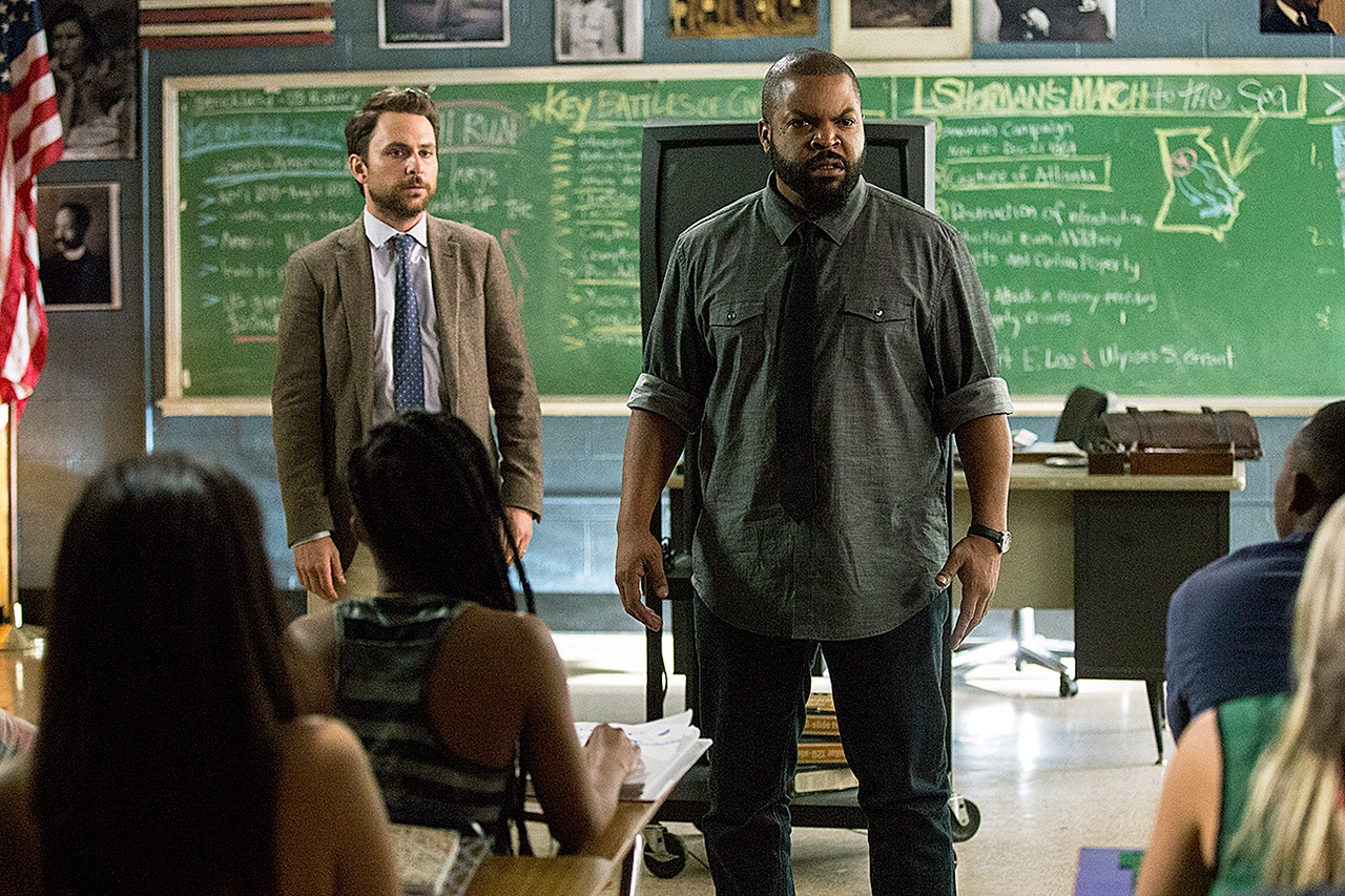 Ice Cube (right) and Charlie Day play teachers who want to take it behind the gym in “Fist Fight.” (Warner Bros.)