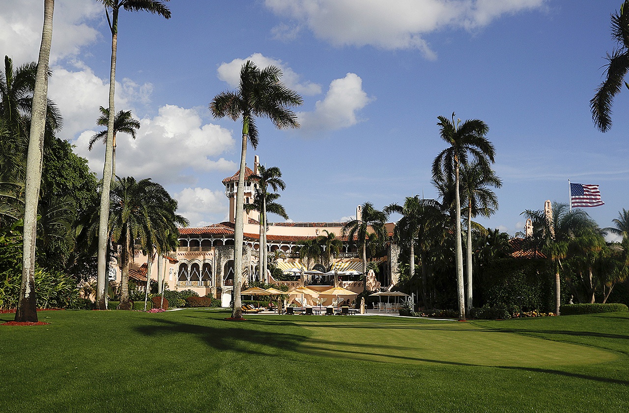In this 2016 photo, Mar-a-Lago is seen from the media van window in Palm Beach, Florida. Trump has described the sprawling Mar-a-Lago property as the Winter White House and has spent two weekends there this month. (AP Photo/Carolyn Kaster, File)
