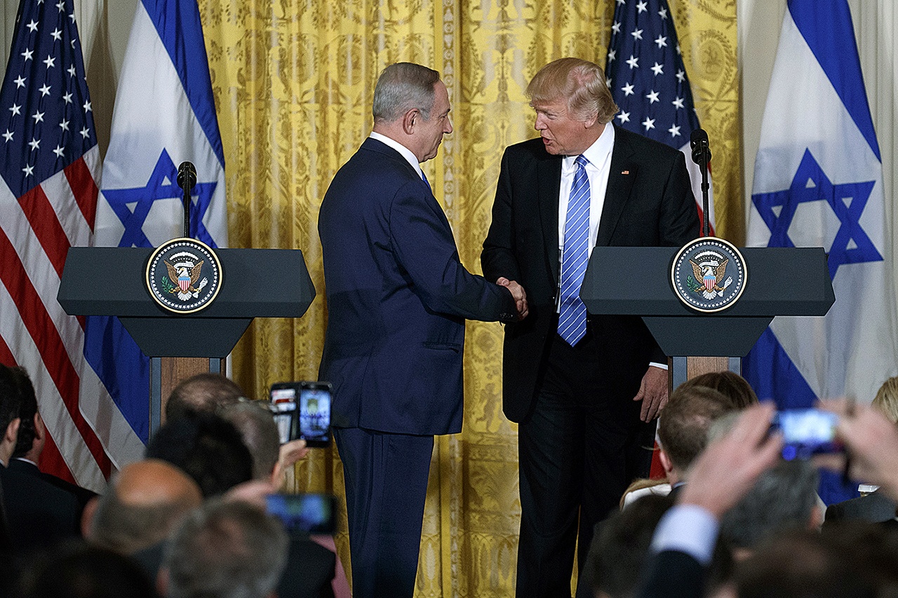 President Donald Trump and Israeli Prime Minister Benjamin Netanyahu shake hands during their joint news conference in the East Room of the White House on Wednesday, Feb. 15, in Washington. (AP Photo/Evan Vucci)