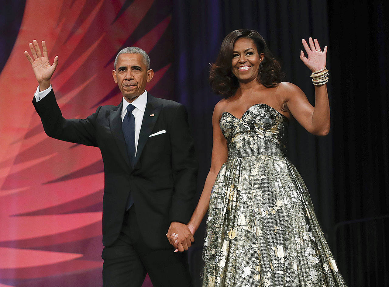 This Sept. 2016 hoto shows President Barack Obama and first lady Michelle Obama at the Congressional Black Caucus Foundation’s 46th Annual Legislative Conference Phoenix Awards Dinner in Washington. (AP Photo/Pablo Martinez Monsivais, File)