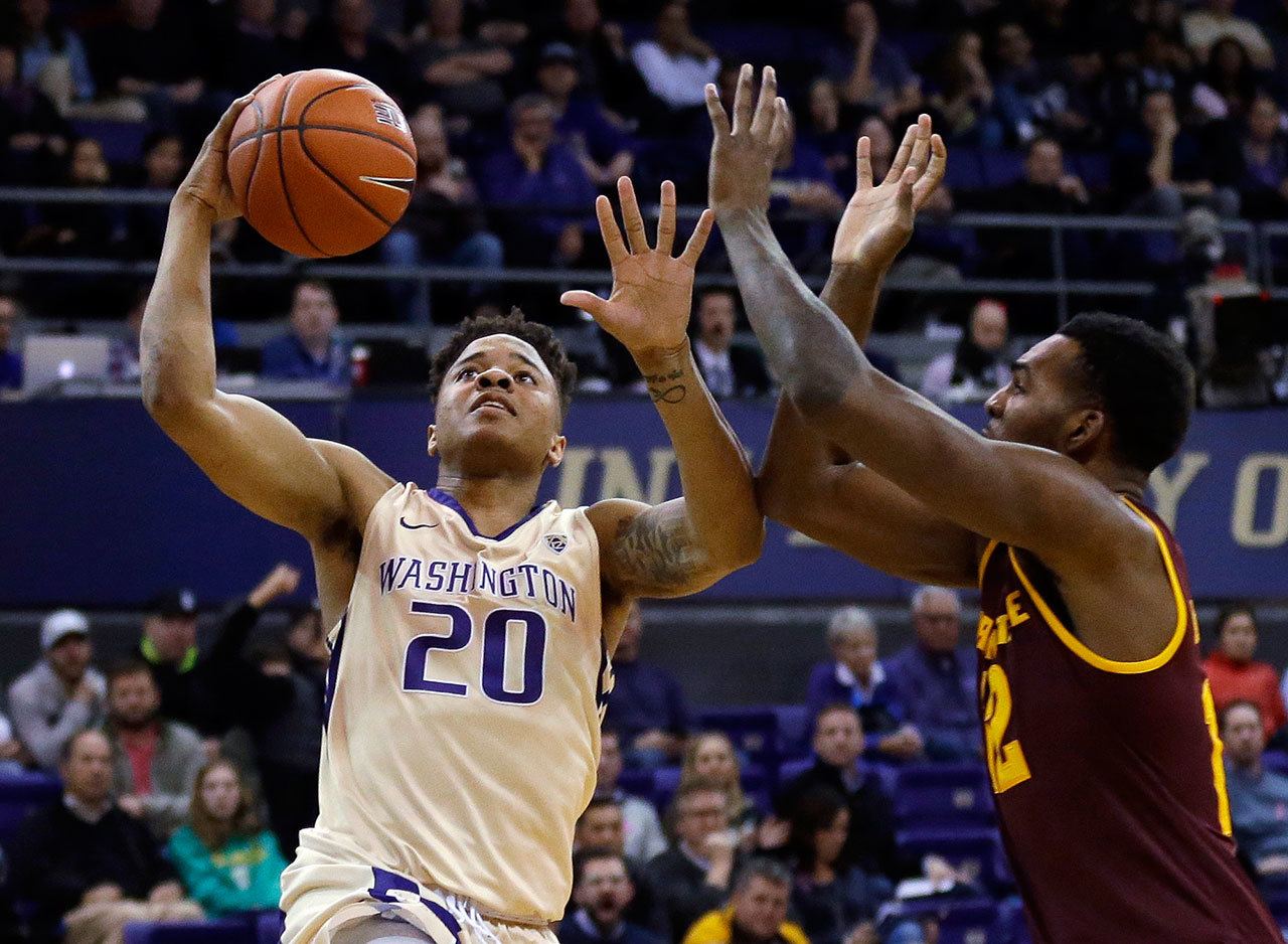 Washington guard Markelle Fultz (20) draive for a layup against Arizona State forward Andre Adams during the first half of a game Feb. 16, 2017, in Seattle. (AP Photo/Ted S. Warren)