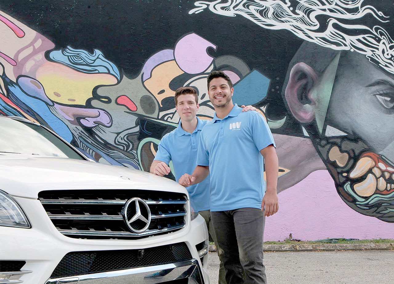 Nathan Bekerman, left, and Tarek El Gammal are co-founders of WashMyWhip, an on-demand, eco-friendly car-care service based at in Wynwood, Florida. (Roberto Koltun / Miami Herald)