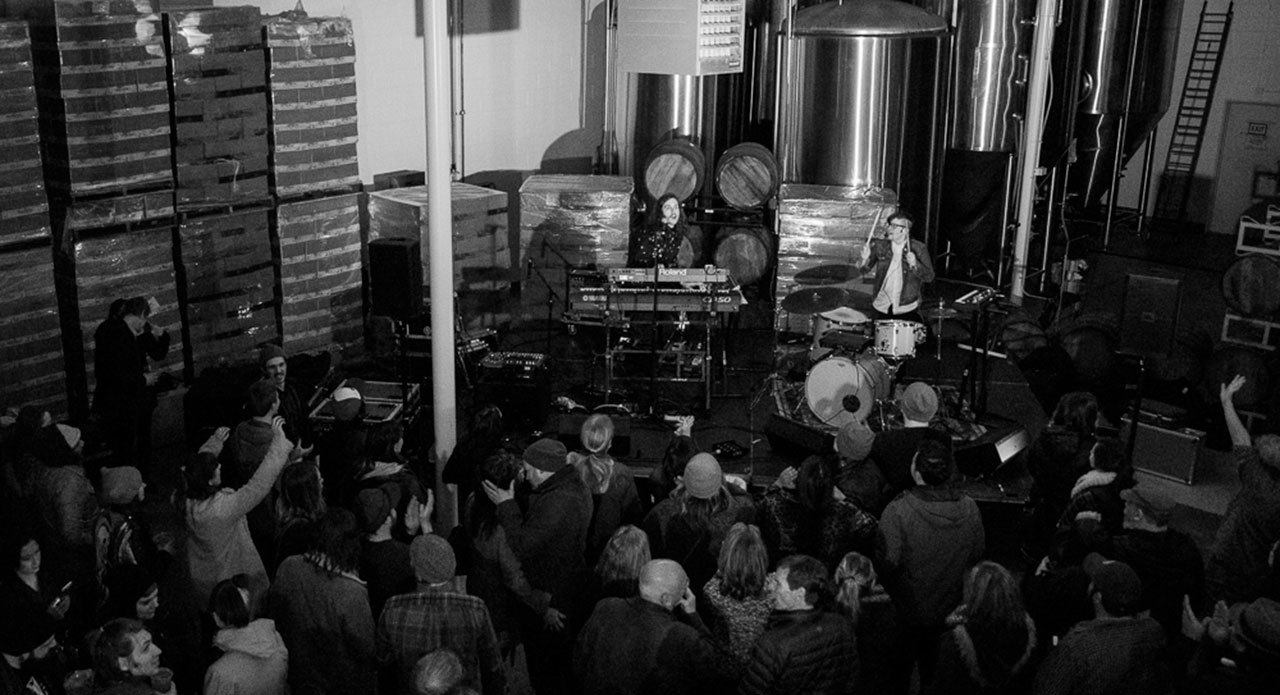 SISTERS, a Seattle-based duo, plays during the Fisherman’s Village Music Festival lineup announcement party Friday, Feb. 10, at the Scuttlebutt Brewery and Taproom in Everett. (Photo by Christine Mitchell)