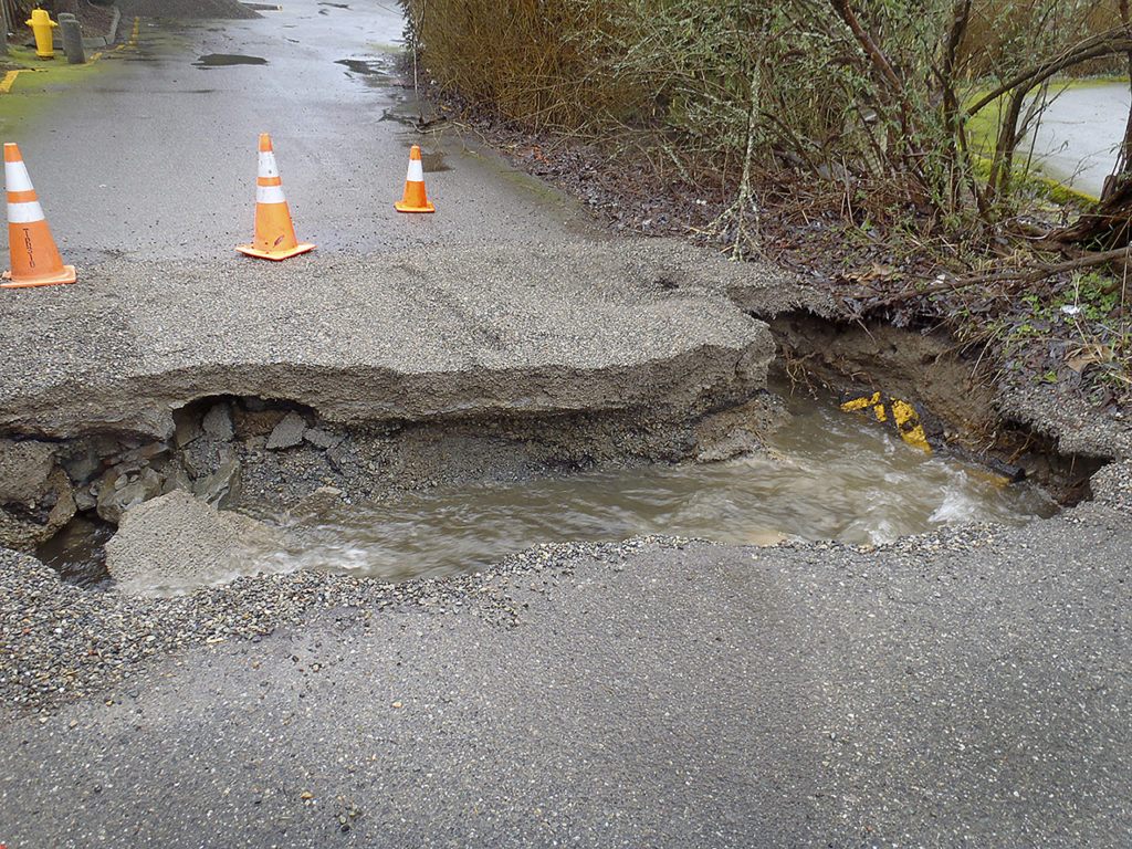 Rainfall on Feb. 9 caused flooding along Scriber Creek in Lynnwood, including the collapse of a key culvert on private property near Wilcox Park. (City of Lynnwood)
