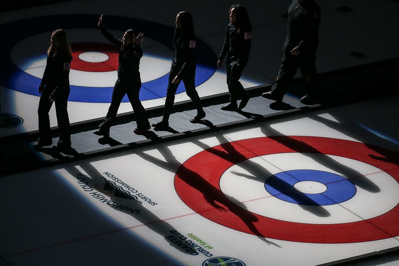 Curling athletes are introduced during the opening ceremony of the 2017 USA Curling Nationals on Feb. 11, 2017 at Xfinity Arena in Everet. (Kevin Clark / The Herald)