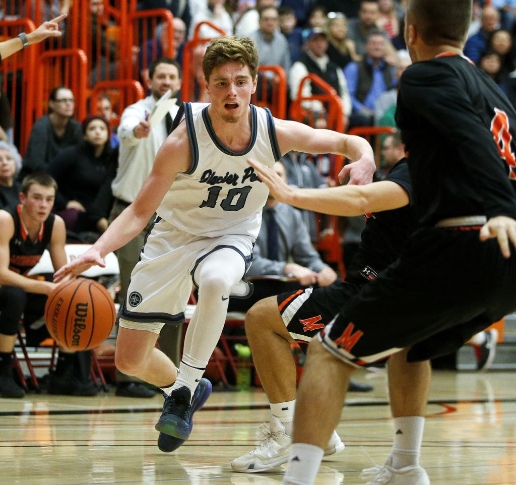 Glacier Peak’s Seiver Southard (10) drives to the hoop during the Class 4A District 1 boys basketball championship game against Monroe at Everett Community College on Thursday, Feb. 16. (Ian Terry / The Herald)
