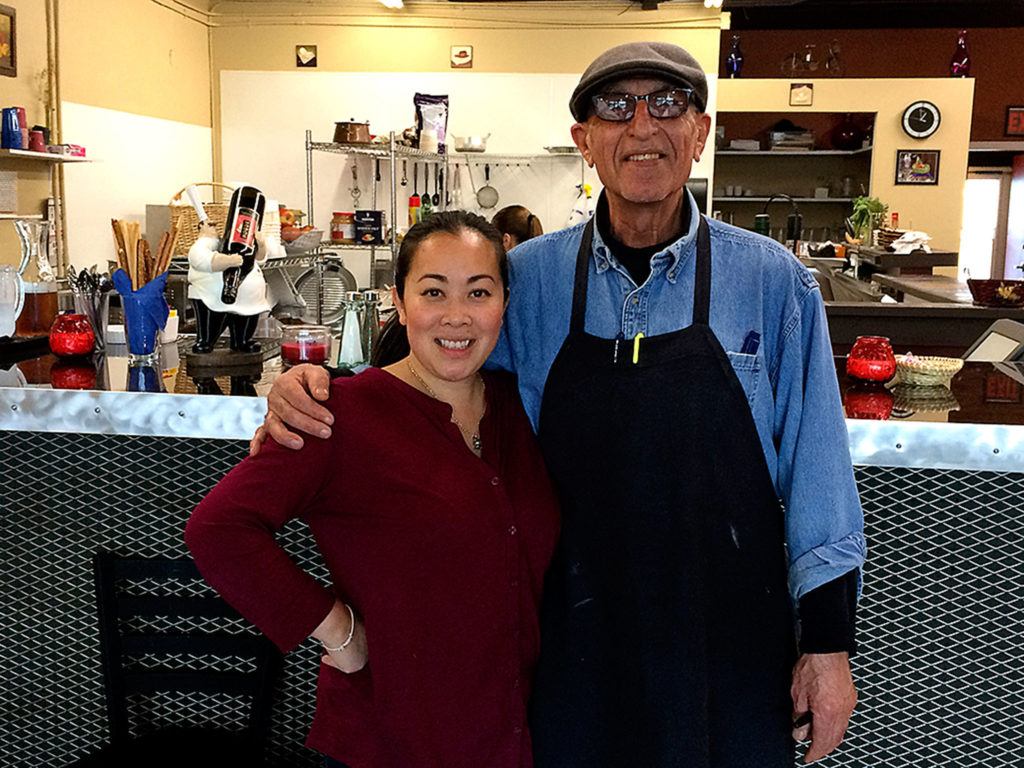 Neary Ouch, left, and Ali Kalantari run Cafe Dijon on Broadway in Everett.