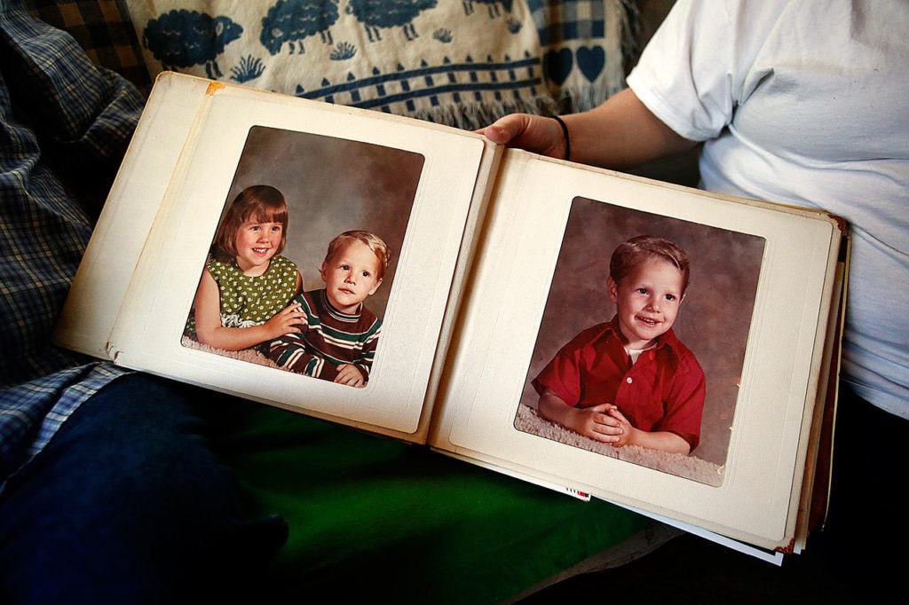 Stephanie Powell Leisure and Gordon Powell Sr. share family photos of happier days. Stephanie was 21 months older than her brother Gordon “Casey” Powell Jr., who was killed by a fellow inmate in the Monroe Correctional Complex in 2015. The brother and sister shared a room for much of their childhood and she later became his legal guardian. In the photo to the left, Stephanie is believed to be 4 and Casey 2. (Photo courtesy Stephanie Powell Leisure)
