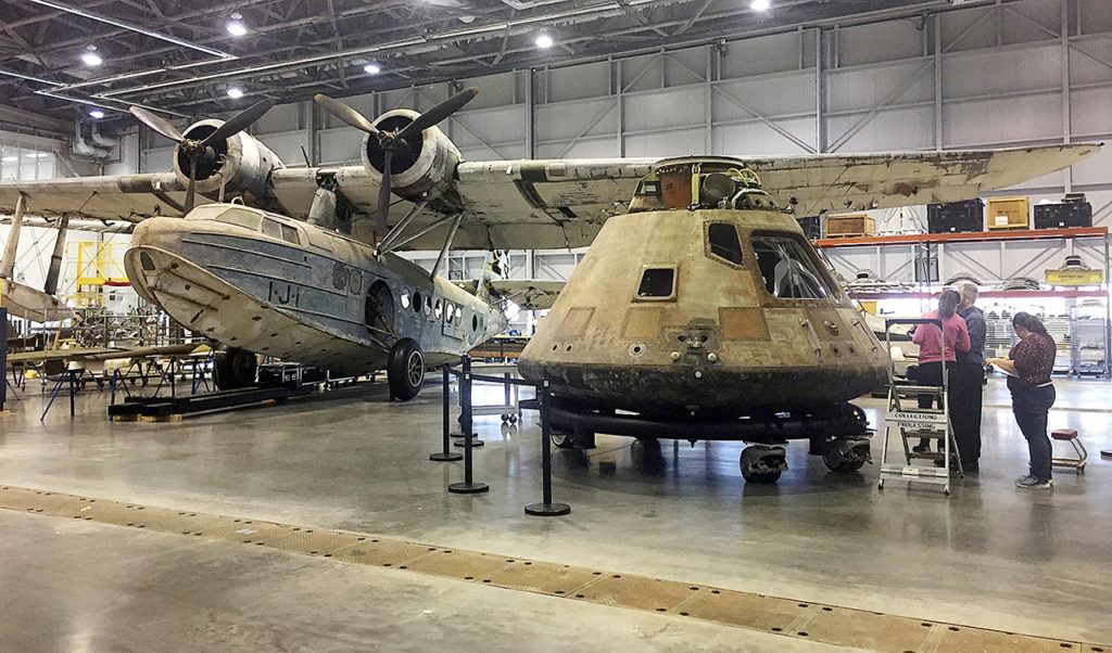 In this Feb. 17 photo, the Apollo 11 capsule sits in the restoration hanger at the National Air and Space Museum’s Steven F. Udvar-Hazy Center in Chantilly, Virginia, ahead of a planned four-city tour. (AP Photo/Jessica Gresko)
