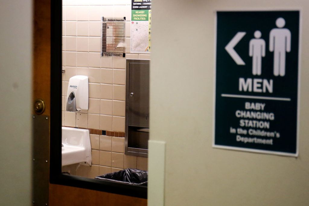 Large windows were installed on restroom doors at the Everett Public Library for added safety. (Kevin Clark / The Herald)
