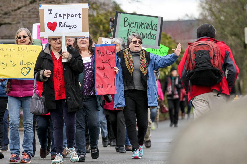 Marchers make their way from Trinity Episcopal Church Sunday afternoon in Everett on February 26, 2017. (Kevin Clark / The Herald)

