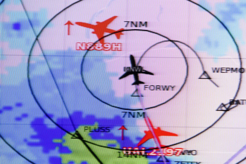 Three planes are seen on a monitor during a flight to test NextGen technologies for improved air traffic efficiency on Thursday, Feb. 9. (Ian Terry / The Herald)

