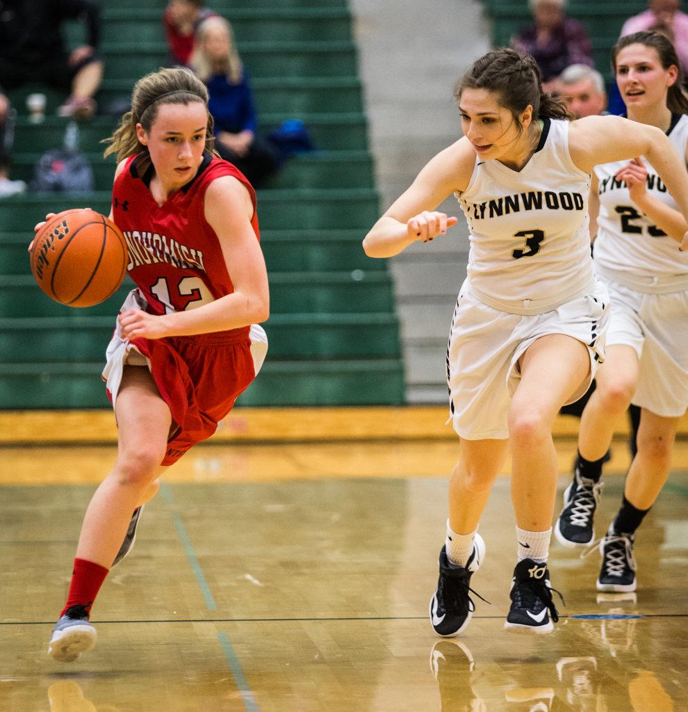 Snohomish’s Maya DuChesne drives the ball down the court during the championship game of the 3A District 1 girls basketball tournament Feb. 17, 2017, at Jackson High School in Mill Creek. Lynnwood beat Snohomish 55-53. (Daniella Beccaria / The Herald)
