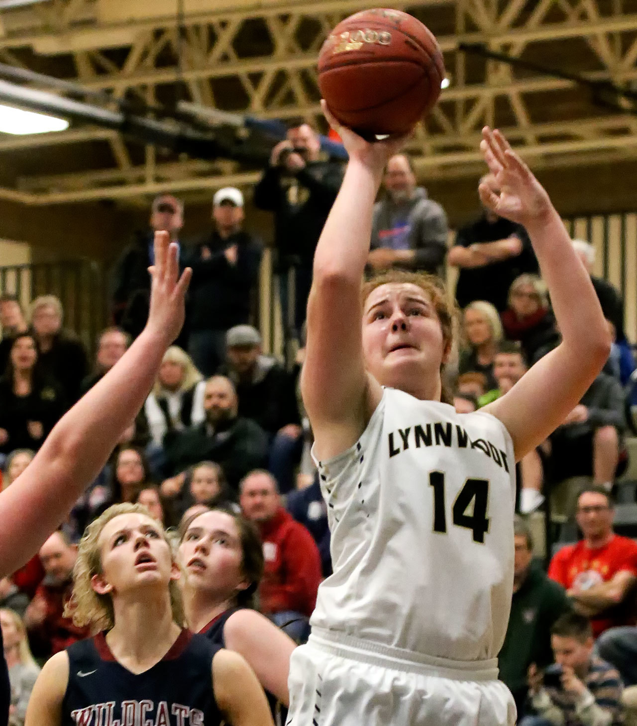 Lynnwood’s Kelsey Rogers attempts a shot against Mt. Spokane during a regional playoff game on Feb. 25, 2017, at Bothell High School. Lynnwood won 57-46. (Kevin Clark / The Herald)
