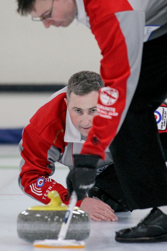 Lynnwood’s Brady Clark (left) and Seattle’s Phil Tilker practice on Feb. 8, 2017, at the Granite Curling Club in Seattle. (Kevin Clark / The Herald)
