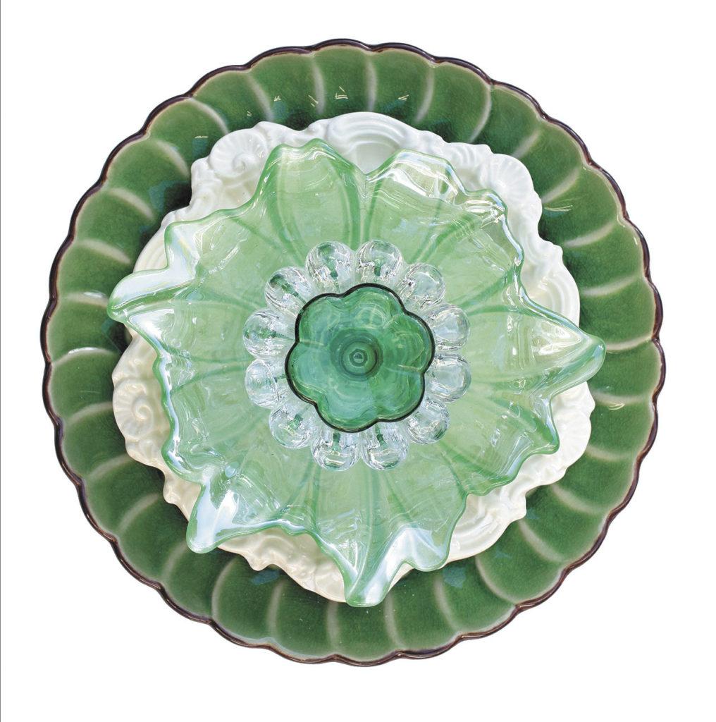 Glass flower sculpture made from recycled glassware by Lynn Jefferson. (Andy Bronson / The Herald)
