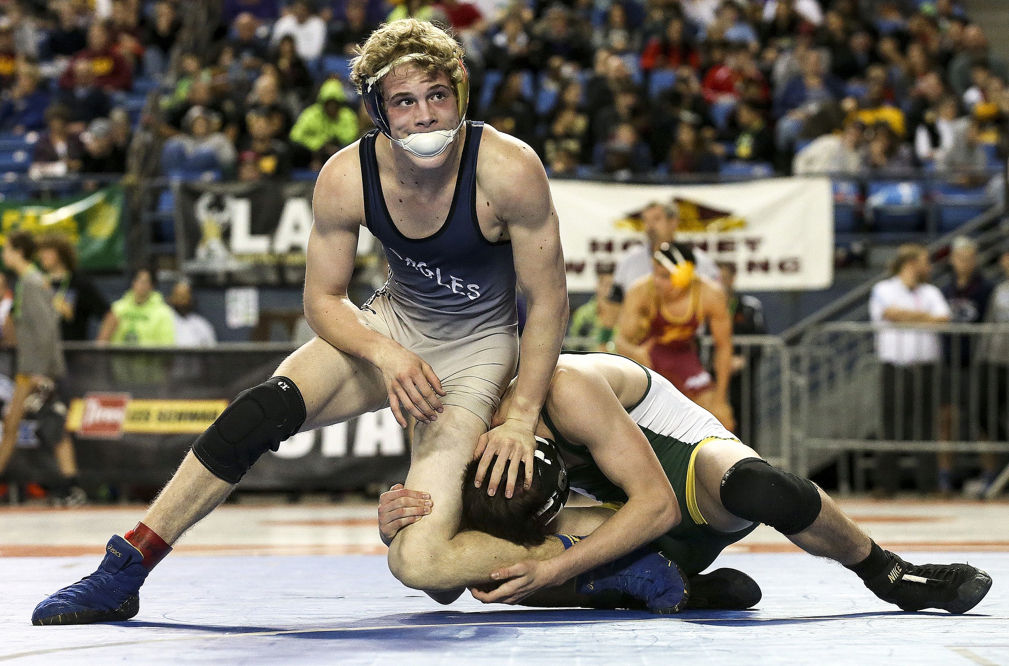 Kevin Clark / The Herald                                Gavin Rork of Arlington (left) is one of several local wrestlers who will be vying for state honors this weekend at Mat Classic XXIX in the Tacoma Dome.