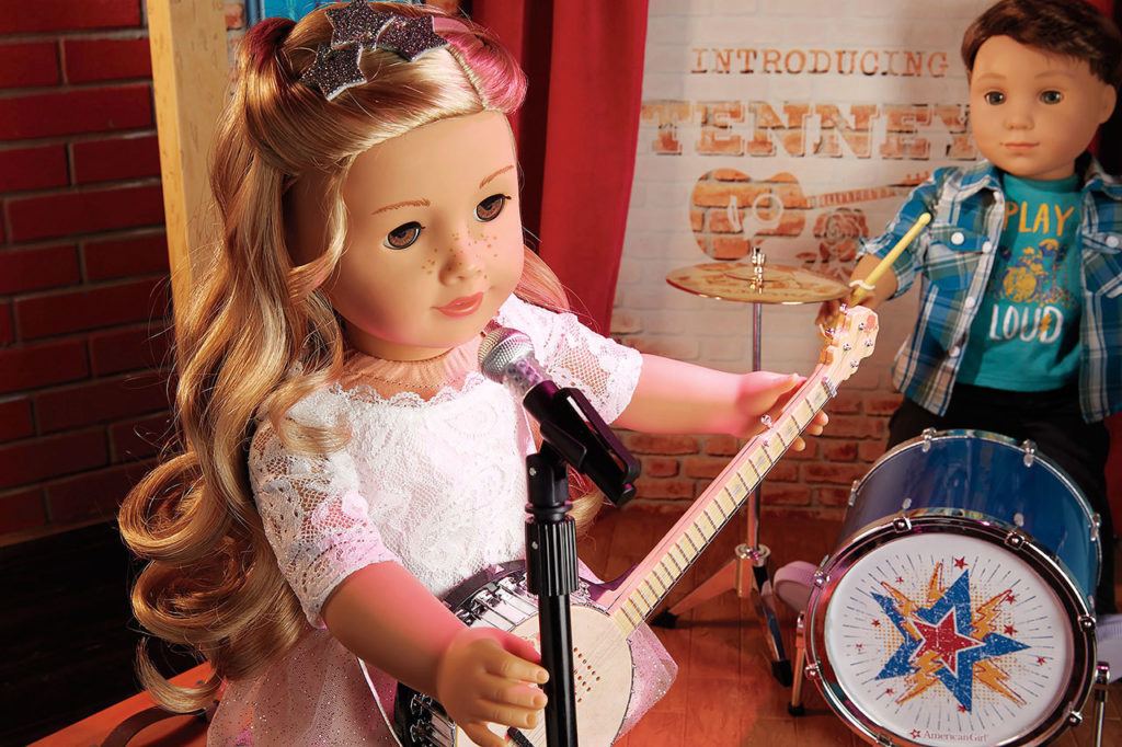 In doll world, boy doll Logan Everett is the drummer bandmate to girl doll Tenney Grant. Logan Everett is the first-ever boy by American Girl dolls in its more than 30-year history. Both of the 18-inch dolls hit the market last Thursday. Dolls are sold separately for $115. (American Girl)
