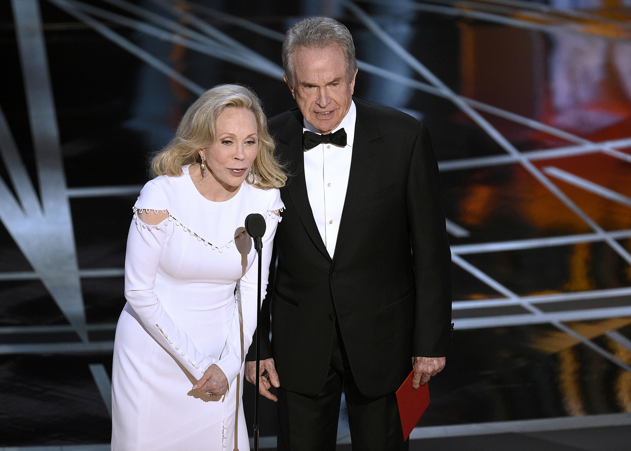 Chris Pizzello / Invision                                Faye Dunaway and Warren Beatty present the award for best picture at the Oscars on Sunday at the Dolby Theatre in Los Angeles. Dunaway read “La La Land” as the winner before host Jimmy Kimmel came forward to announce that “Moonlight” had indeed won, showing the inside of the envelope as proof.