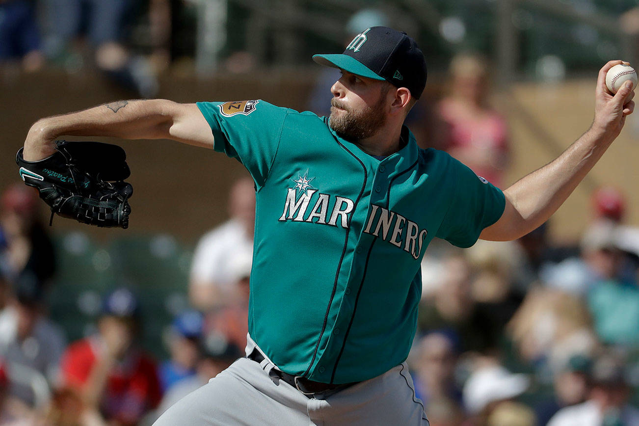 Mariners pitcher James Paxton throws during fourth inning of a March 4 spring training game in Scottsdale, Ariz. (AP Photo/Chris Carlson)