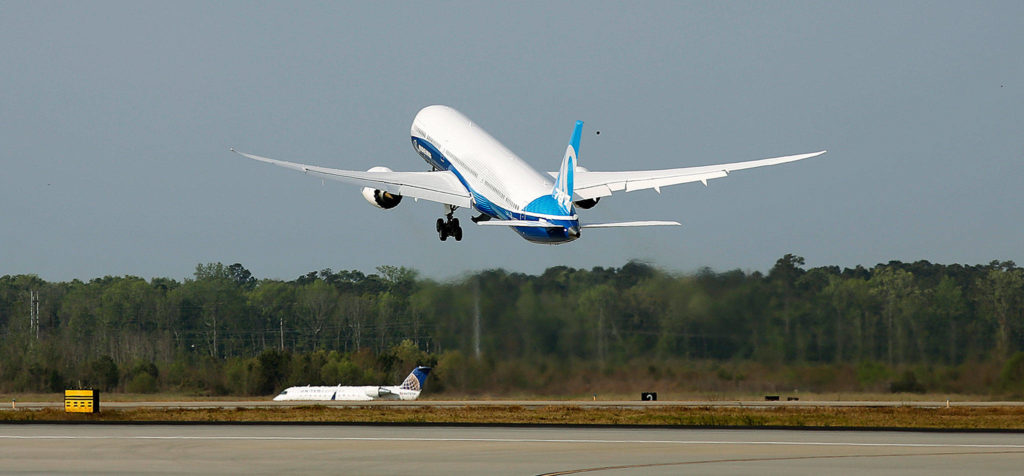 The new Boeing 787-10 Dreamliner lifts off from the runway for its first flight at Charleston International Airport in North Charleston, S.C., on Friday. (AP Photo/Mic Smith) 
