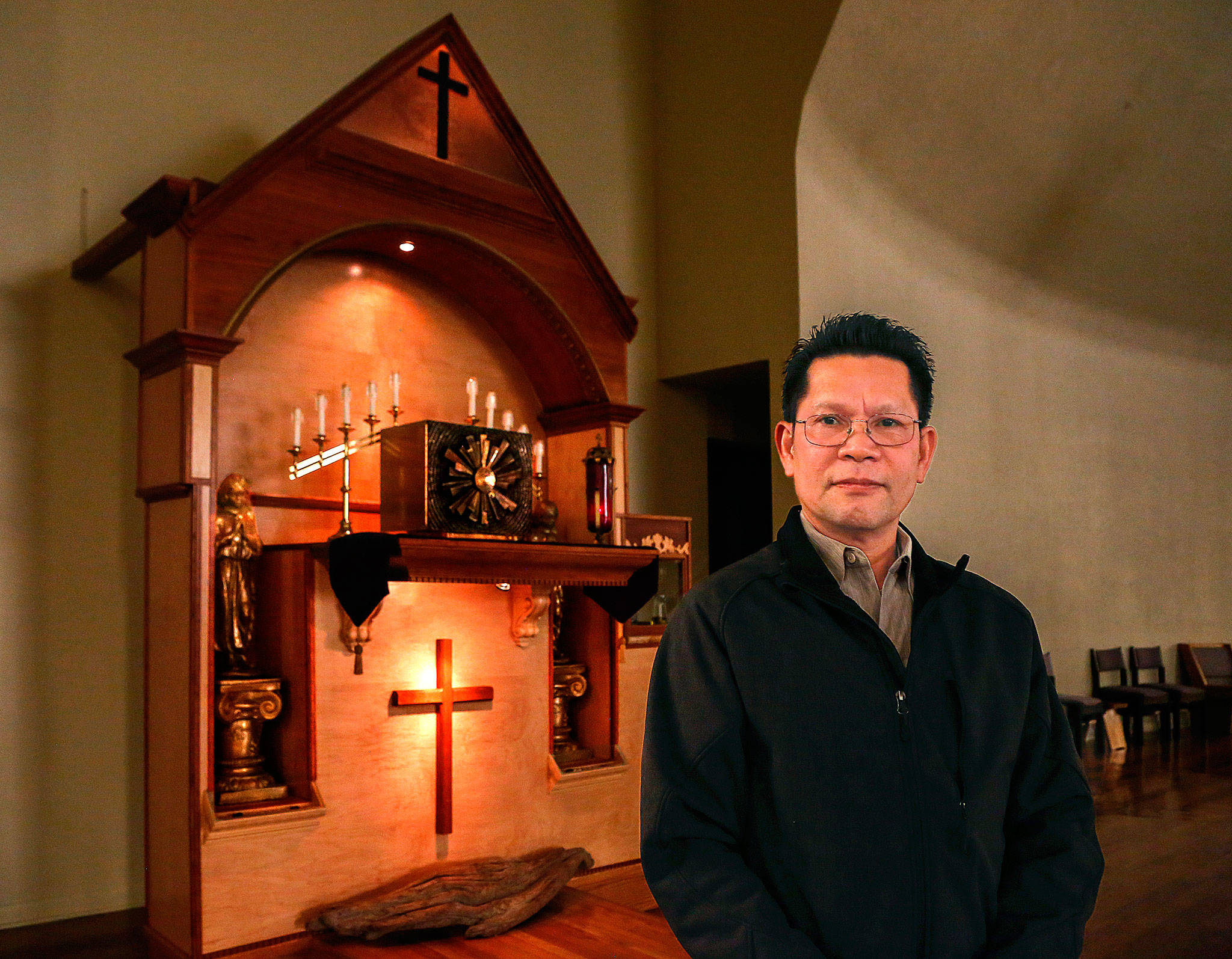 After thieves busted St. Mary Catholic Church’s tabernacle last month, police said it was destroyed. However, resourceful parishioner Dang Mai, 59, of Marysville found a way to fix it, and did so. (Dan Bates / The Herald)