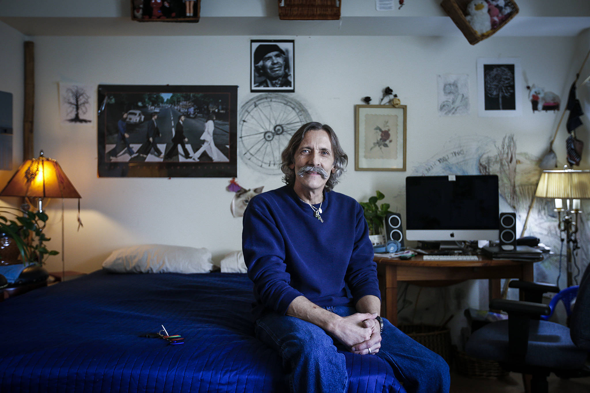 Three years ago, Dennis Bateman, now 63 years old, moved into his first apartment, Patrick Place on Aurora Avenue North in Seattle. Bateman, who spent decades addicted to heroin after escaping a physically and sexually abusive foster family when he was 13, is now sober and lives in the housing facility run by Catholic Housing Services. “Once I was safe and got a place to live, I just thought ‘I don’t need that anymore’,” Bateman said about his drug use. A project to build a similar apartment building is now underway in Everett. (Ian Terry / The Herald)