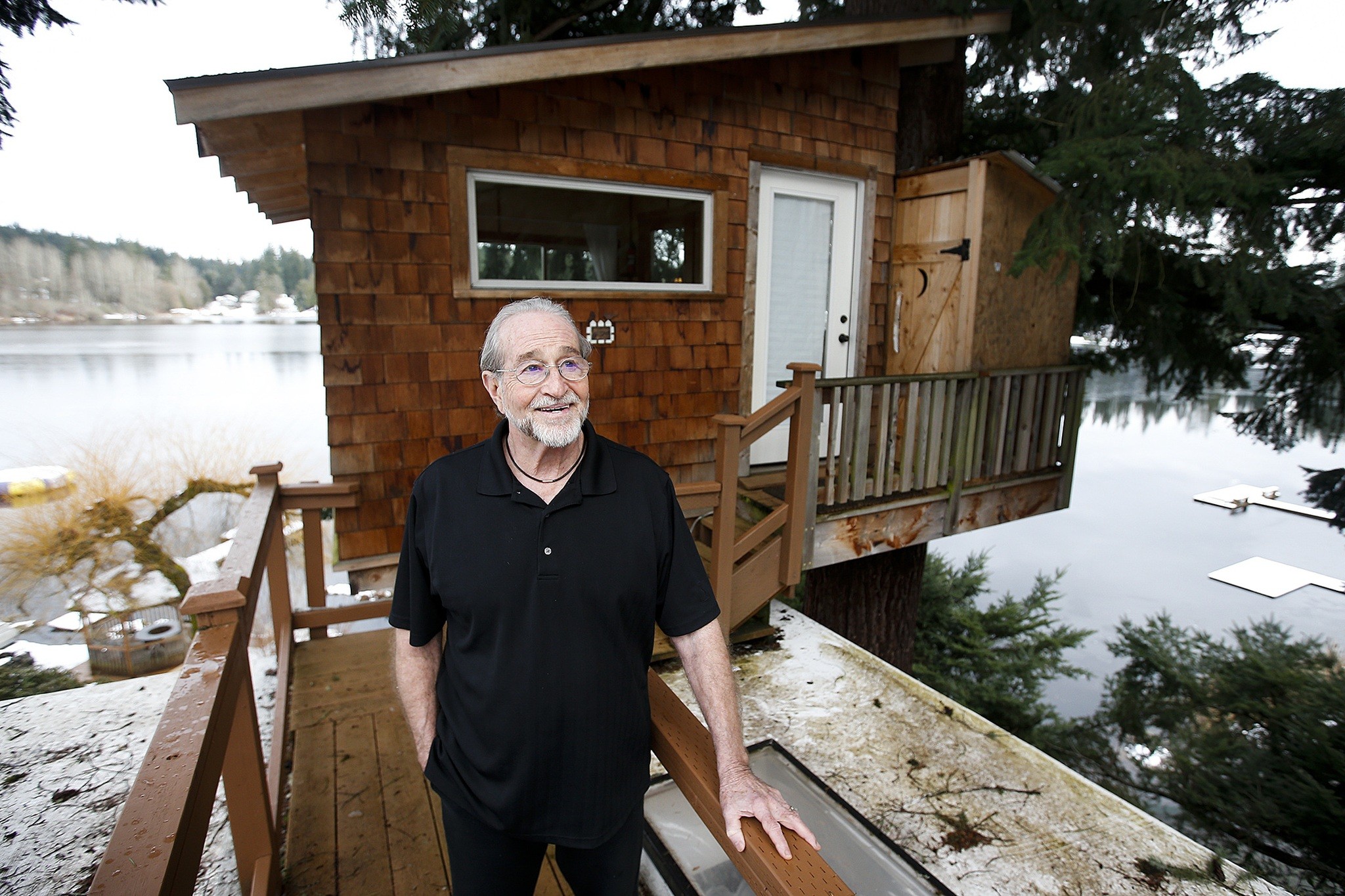 John Shephard enlisted the help of Pete Nelson, a treehouse builder featured on Animal Planet’s “Treehouse Masters” television show, to construct the treehouse he now leases as bed and breakfast on Cottage Lake near Woodinville. (Ian Terry / The Herald)