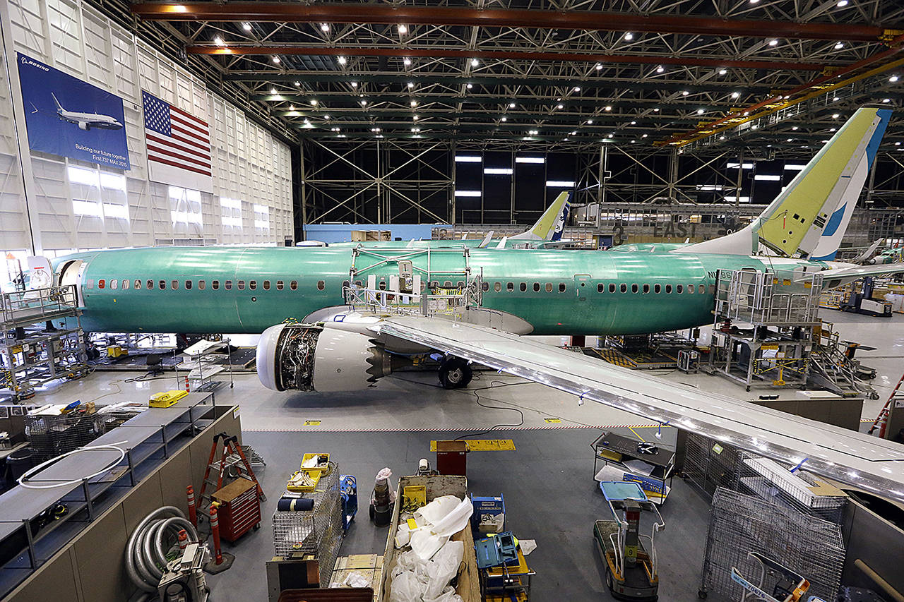In this Feb. 13 photo, the first of the large Boeing 737 MAX 9 models, expected to begin test flights in April, sits at the front of the assembly line and almost ready to roll out at the company’s airplane production facility in Renton. (AP Photo/Elaine Thompson, File)